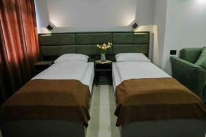 Postel nebo postele na pokoji v ubytování Апарт-отель Nine Rooms