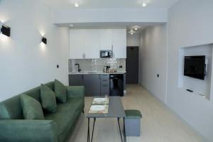Kuchyň nebo kuchyňský kout v ubytování Апарт-отель Nine Rooms