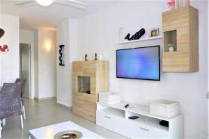 TV a/nebo společenská místnost v ubytování Apartamento 1E 2 dormitorios