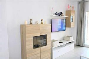 TV a/nebo společenská místnost v ubytování Apartamento 1E 2 dormitorios