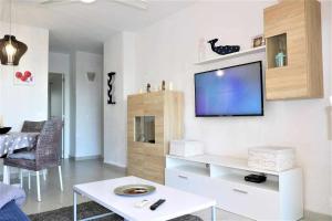 TV a/nebo společenská místnost v ubytování Apartamento 1E 2 dormitorios