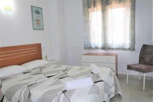 Postel nebo postele na pokoji v ubytování Apartamento 1E 2 dormitorios