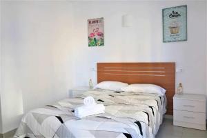Postel nebo postele na pokoji v ubytování Apartamento 1E 2 dormitorios