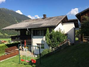 a house with a basketball hoop in front of it at Haus Bergblick in Gaschurn