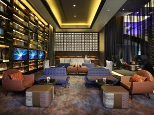 TV o dispositivi per l'intrattenimento presso Rendezvous Hotel Singapore by Far East Hospitality