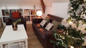 Posezení v ubytování Les 7 Tilleuls - Chambres d'hôtes