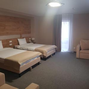 Ένα ή περισσότερα κρεβάτια σε δωμάτιο στο Гостиница " Сызрань"
