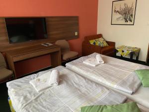 Letto o letti in una camera di Formanka Hotel & Camp