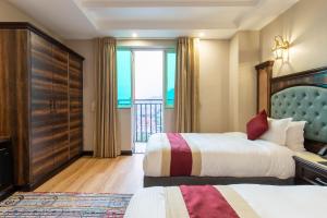Voodi või voodid majutusasutuse Hotel Pabera Heritage Boutique toas