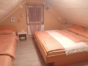 Postel nebo postele na pokoji v ubytování APP GAIA MAIA, Terme Čatež