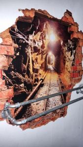 einen Tunnel mit Licht am Ende in der Unterkunft Kohle und Stahl in Hattingen