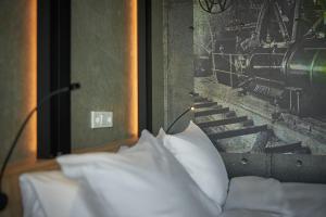 Postel nebo postele na pokoji v ubytování Inntel Hotels Amsterdam Landmark