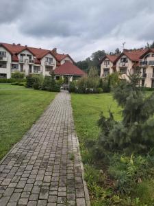 Κήπος έξω από το Mieszkanie z ogródkiem w Ustroniu