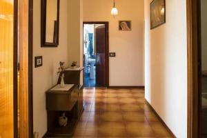 a hallway with aoyer with a door and a tile floor at LA CASA DE FASCIA' Contrada pescara valle in Monte San Pietrangeli +42 photos