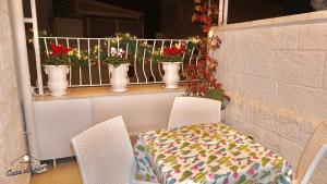 Balkón nebo terasa v ubytování My Monopoli- Casa dei Fiori "Orchidea" Centro Storico