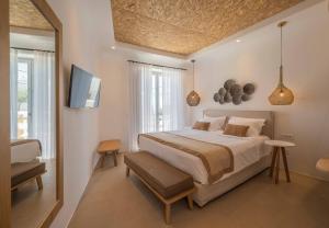 Cama ou camas em um quarto em Argo Hotel