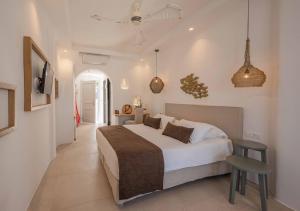 Cama ou camas em um quarto em Argo Hotel