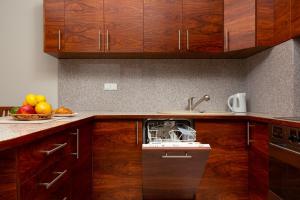 Kuchyň nebo kuchyňský kout v ubytování Apartments Chełmońskiego Warsaw Ursus by Noclegi Renters