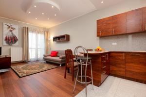 Posezení v ubytování Apartments Chełmońskiego Warsaw Ursus by Noclegi Renters