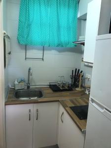 Kuchyň nebo kuchyňský kout v ubytování apartamento Torreblanca del sol Beach