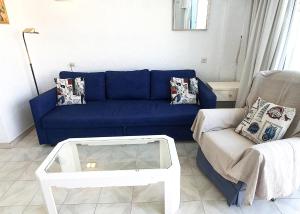 Posezení v ubytování Skol 701. One Bedroom Duplex with Exceptional Sea Views. + 17 fotografií