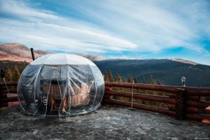 a dome tent sitting on top of a mountain at Antonia Spa 180 Panaromic View in Ranca
