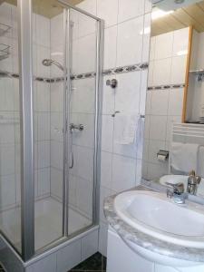 a bathroom with a shower and a sink at Immenstadt im Allgau Holiday Home 2 in Zaumberg