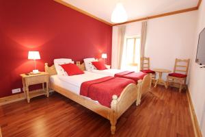 Postel nebo postele na pokoji v ubytování Hôtel de Ville