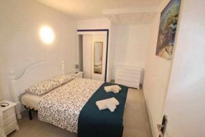 Posteľ alebo postele v izbe v ubytovaní Mare Verde B90 by Tenerife Rental & Sales + 16 fotografií