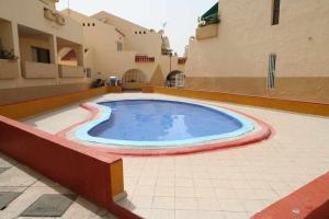 Bazén v ubytovaní Mare Verde B90 by Tenerife Rental & Sales alebo v jeho blízkosti