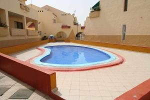 Bazén v ubytovaní Mare Verde B90 by Tenerife Rental & Sales alebo v jeho blízkosti