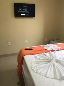 TV a/nebo společenská místnost v ubytování Sunset Hotel