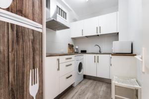 Kuchyňa alebo kuchynka v ubytovaní Sur Suites Perla 6-4