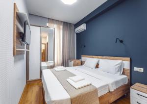 Katil atau katil-katil dalam bilik di 10 KEYS Boutique Hotel