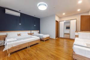 Katil atau katil-katil dalam bilik di 10 KEYS Boutique Hotel