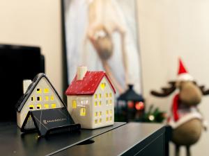 a toy house with a red roof on a table at Kaleidoscope Central in Saint Petersburg