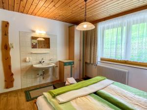 Posteľ alebo postele v izbe v ubytovaní Apartment Baumannerhof-1 by Interhome