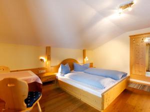 Posteľ alebo postele v izbe v ubytovaní Apartment Moosalm by Interhome
