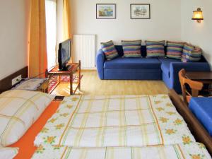Łóżko lub łóżka w pokoju w obiekcie Apartment Anemone by Interhome