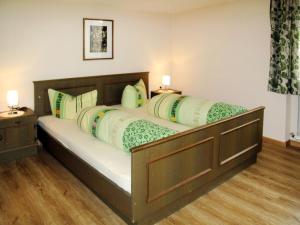 Giường trong phòng chung tại Holiday Home Waldhof - SOE685 by Interhome