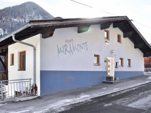 a building with graffiti on the side of it at Apartment Miramonte-2 by Interhome in Kappl