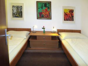 Posteľ alebo postele v izbe v ubytovaní Apartment Seecorso by Interhome