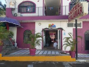 Fasaden eller entrén till Hotel Ayalamar Manzanillo