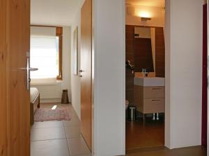 Koupelna v ubytování Apartment Chesa Piz Cotschen 2 by Interhome