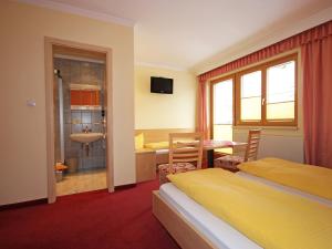 A bed or beds in a room at Apartment Leiter-3 by Interhome