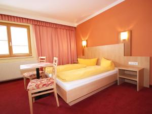 A bed or beds in a room at Apartment Leiter-3 by Interhome