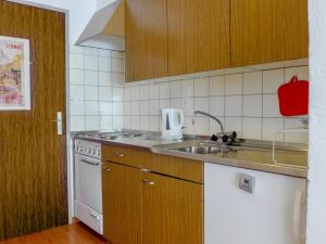 Kuchyň nebo kuchyňský kout v ubytování Apartment Milihaus A by Interhome