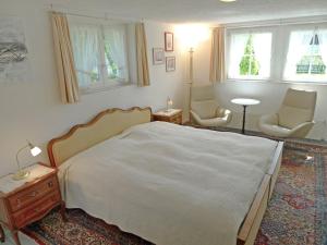 מיטה או מיטות בחדר ב-Apartment Beau Site-1 by Interhome