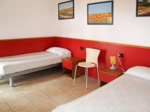 Postelja oz. postelje v sobi nastanitve Apartment La Quercia - CAO424 by Interhome