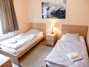 Postel nebo postele na pokoji v ubytování Apartment Barzettes-Vacances 558 - Entrée N- 18 by Interhome